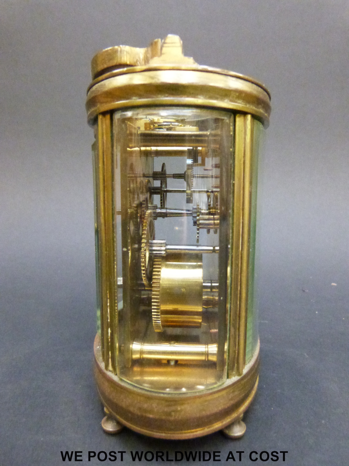A mantel clock of oval section with bevelled glass and pierced gilt foliate panel to dial - Image 2 of 7