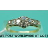 An 18ct gold ring set with eight old cut diamonds (size O)