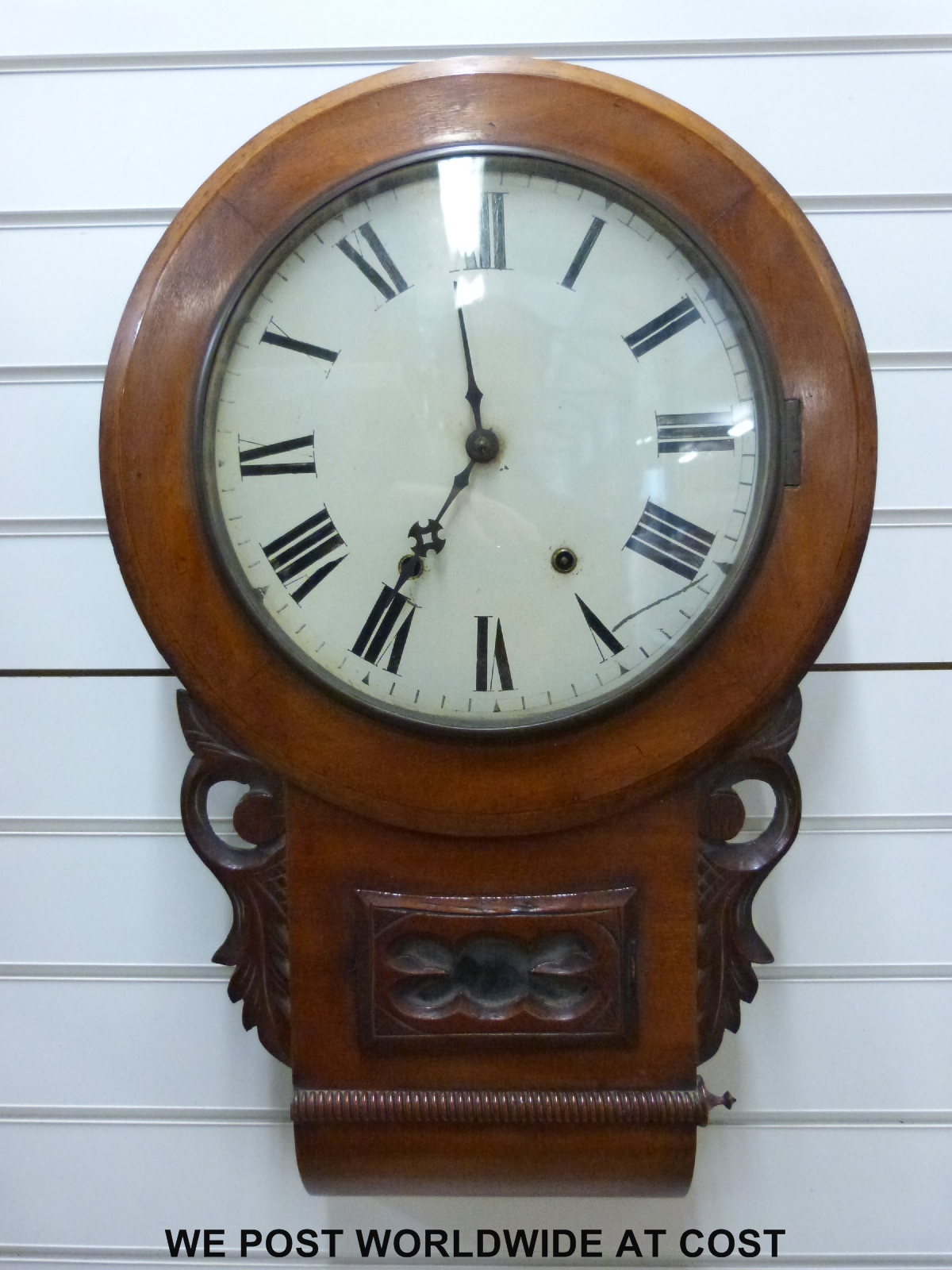 A mid to late 19thC drop dial wall clock, the two train spring driven movement by Ansonia,