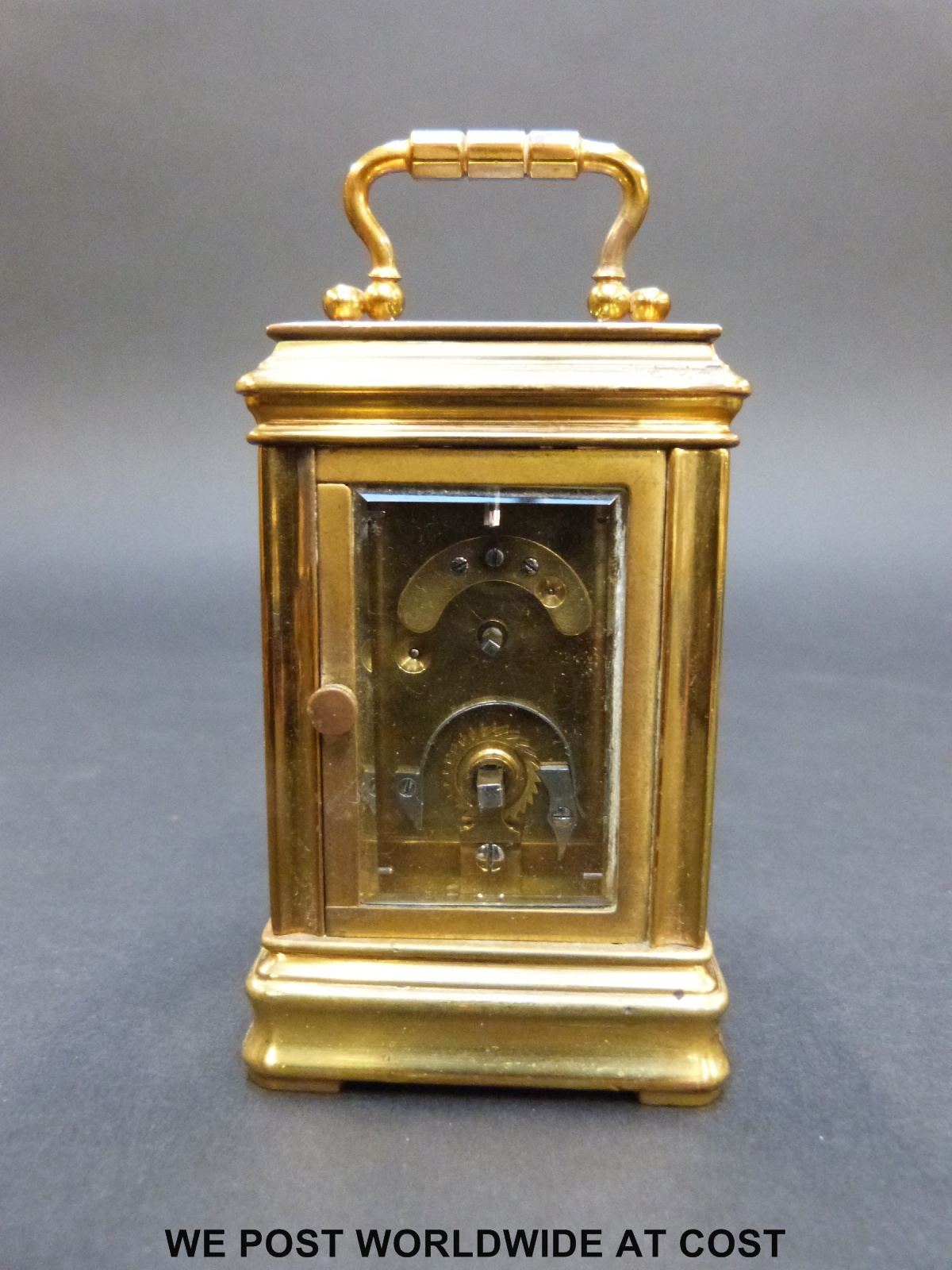 A brass cased miniature carriage clock in corniche style case with inset circular decorated - Image 6 of 9