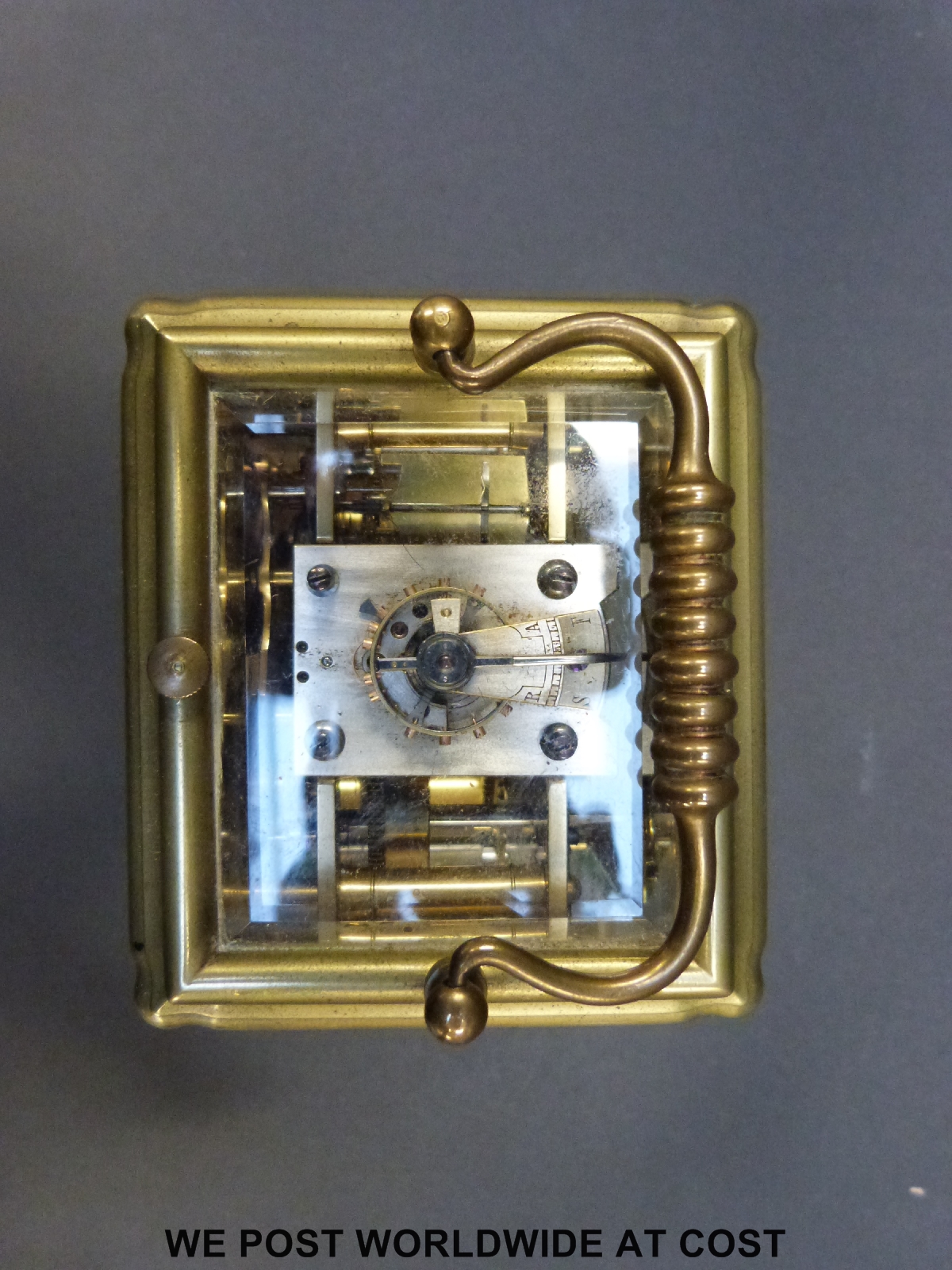 A late 19th / early 20th century brass carriage clock with repeat hourly mechanism striking on a - Image 7 of 7