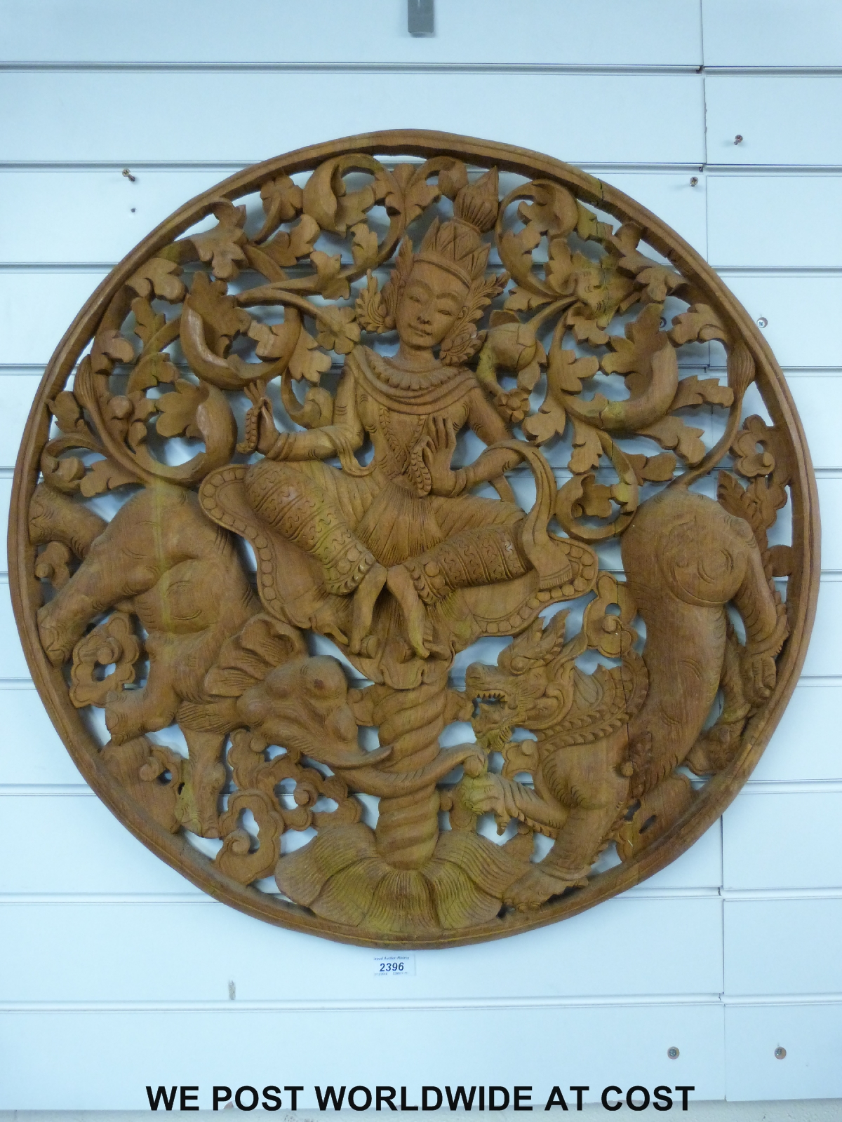 A carved circular Tibetan or similar wooden panel (75cm diameter) - Image 2 of 2