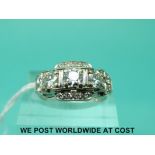 A 14ct white gold ring set with round brilliant cut diamonds (size M)