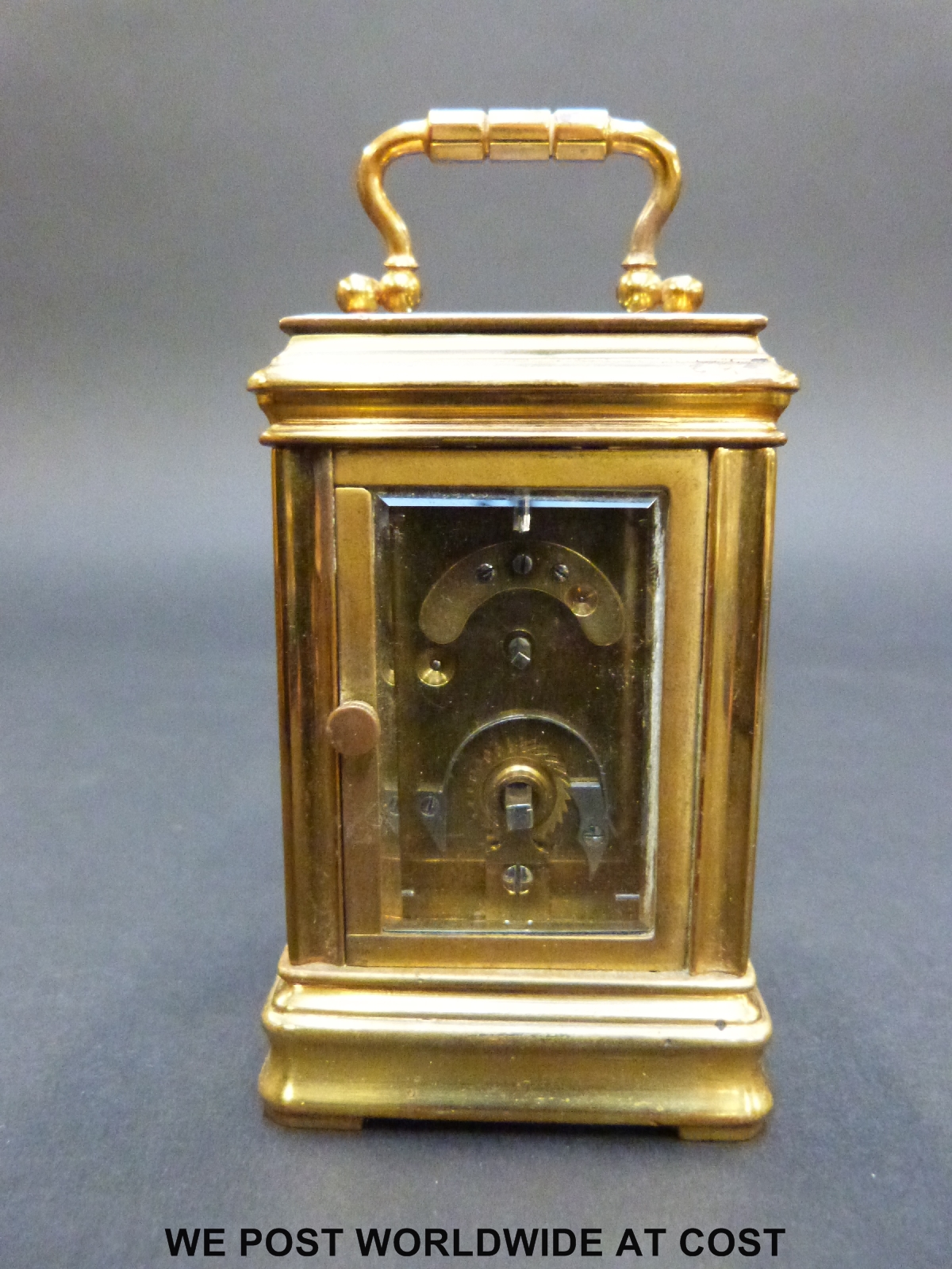 A brass cased miniature carriage clock in corniche style case with inset circular decorated - Image 5 of 9