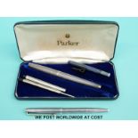 A cased Parker fountain pen marked sterling silver together with a matching similarly marked