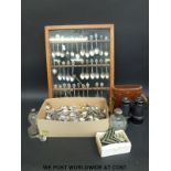 A large collection of plated spoons to include wooden display case,