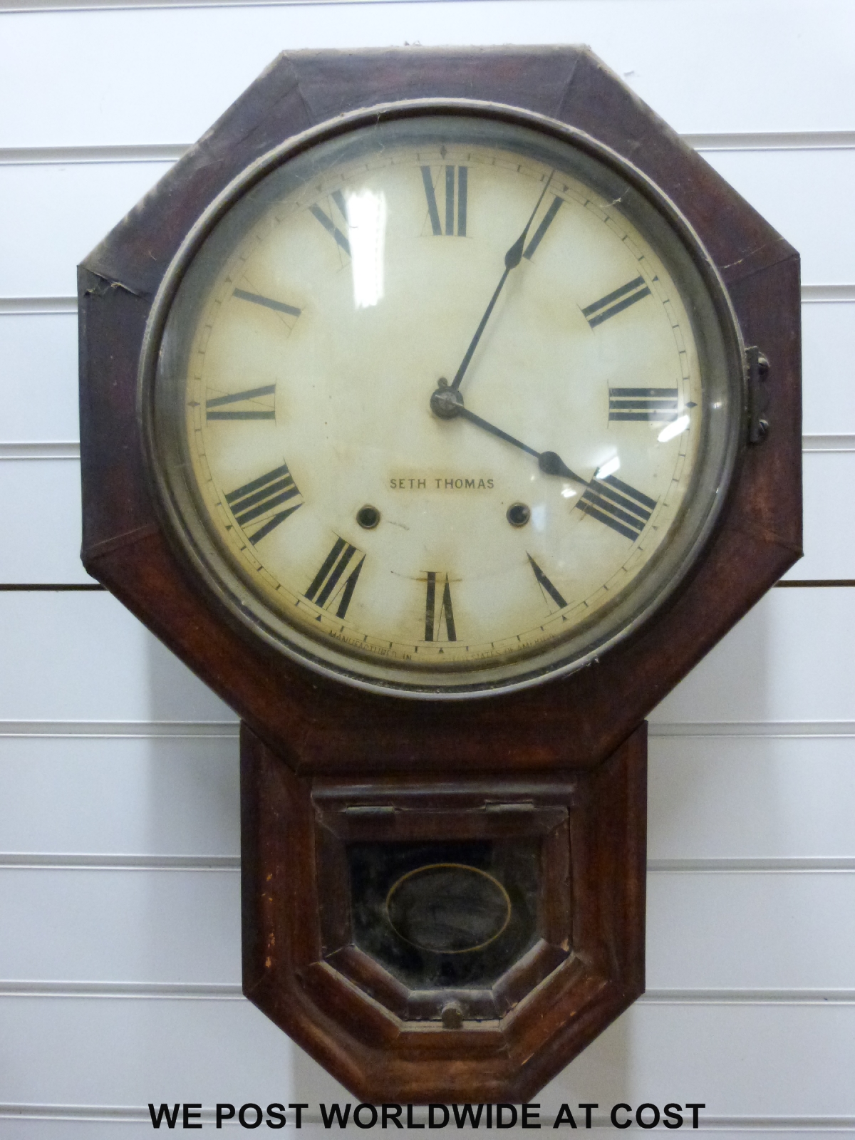 An American drop dial mid to late 19thC wall clock,