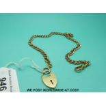 A 9ct gold watch chain and a 9ct gold padlock clasp (48g)