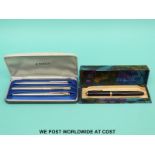 A cased set of three Parker pens,