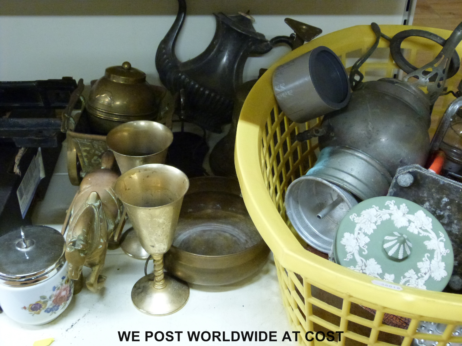 A collection of metalware to include silver plated ware, wall mounted brass bell,