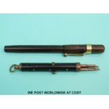A bakelite Swan fountain pen with a 14ct nib and a tri-coloured pencil set with turquoise