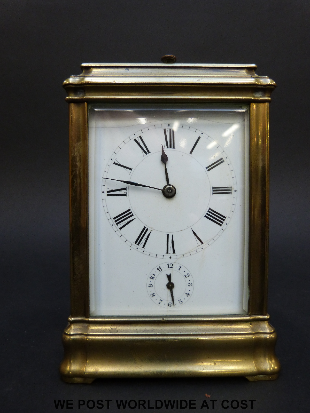 A late 19th / early 20th century brass carriage clock with repeat hourly mechanism striking on a