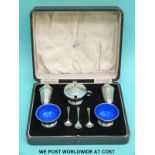 A cased Art Deco hallmarked silver enamelled five-piece cruet, Birmingham 1934,