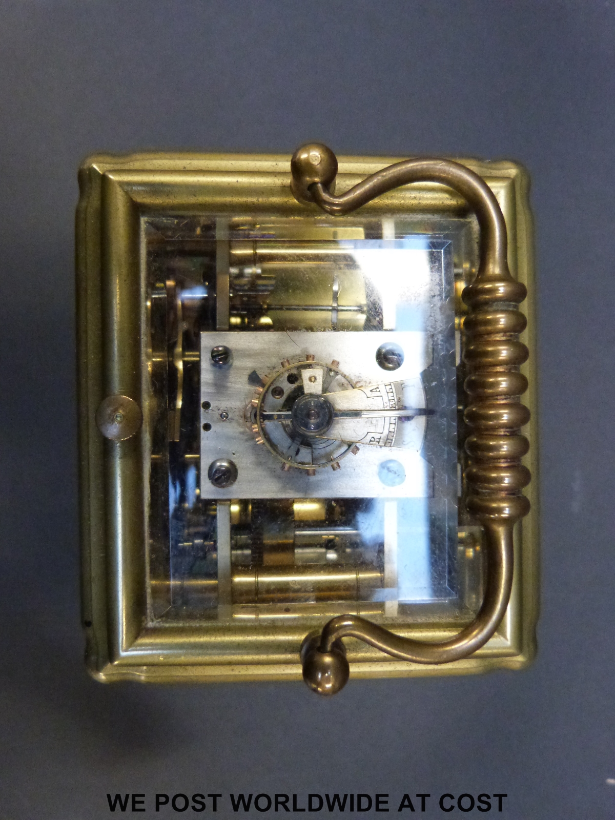 A late 19th / early 20th century brass carriage clock with repeat hourly mechanism striking on a - Image 6 of 7