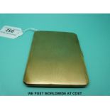 A 9ct gold engine turned cigarette case,