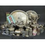 A quantity of plated items to include teapots, trays, cruets, cutlery,
