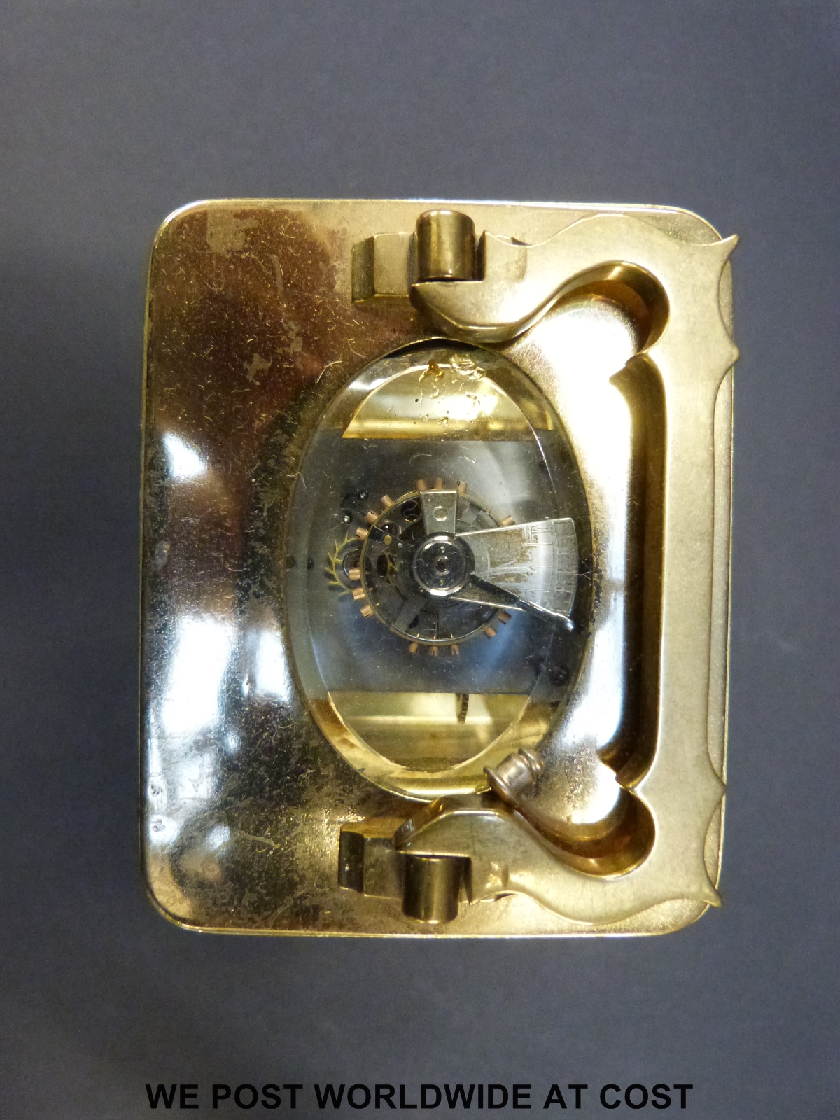 A brass carriage clock in corniche style case, with white enamelled dial, - Image 7 of 7