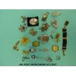 A collection of costume jewellery to include brooches, fob, Mizpah silver ring, a silver spoon,