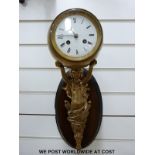 A 19thC wall sconce clock, supported by classical female spelter figure,