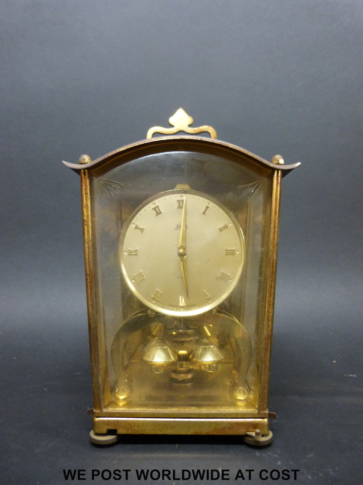 A brass cased German anniversary clock by Schatz, with self colour dial bearing Roman numerals, - Image 2 of 4