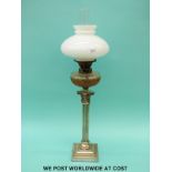 A Corinthian column oil lamp with cut glass reservoir