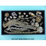 A quantity of costume jewellery to include Sarah Coventry brooch, earrings,