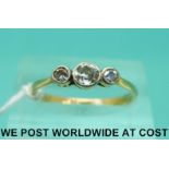 An 18ct gold ring set with three old cut diamonds (size M)