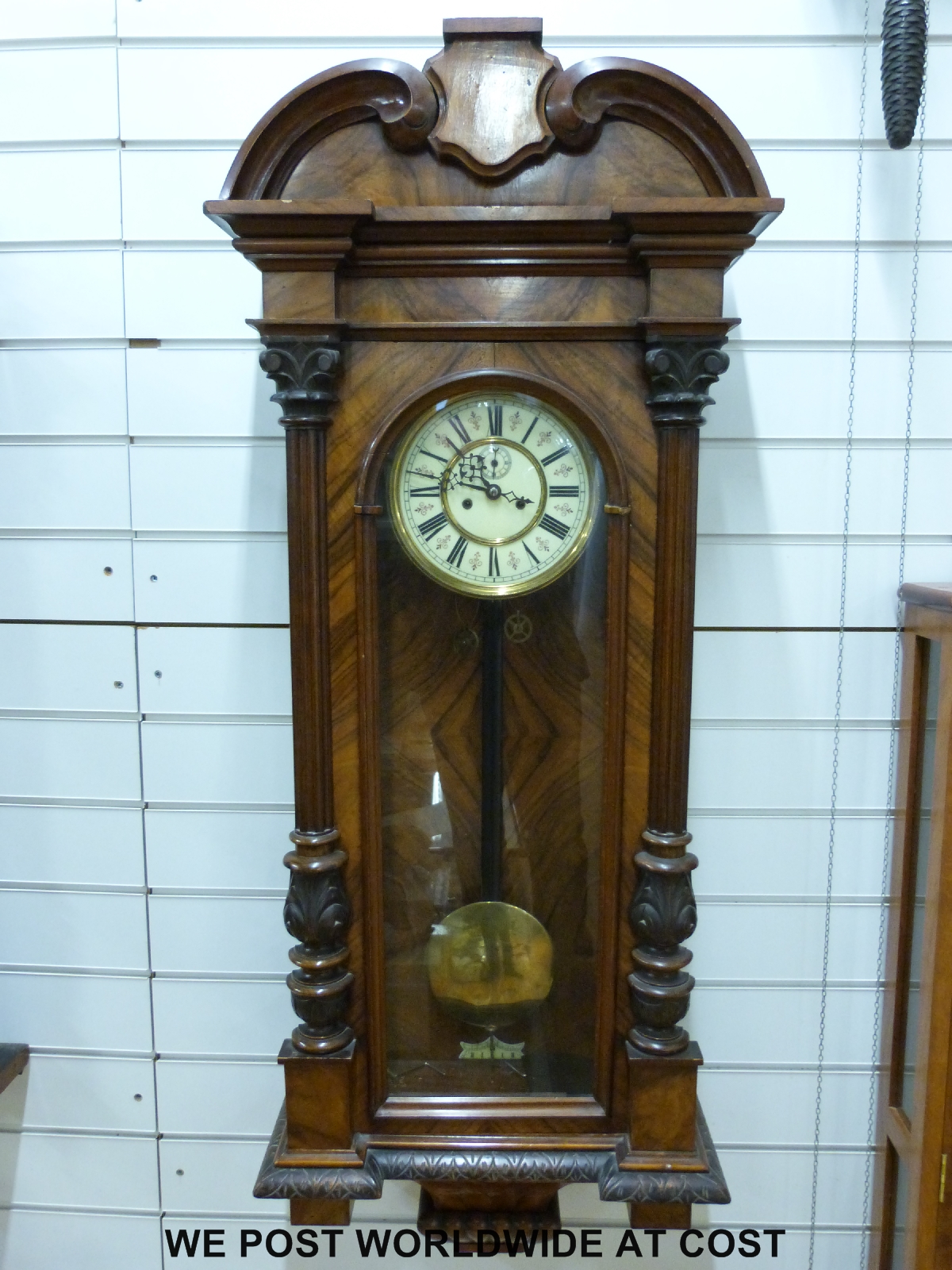 A mid to late 19thC regulator wall clock, the ivory coloured dial with Roman numerals,