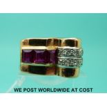 A large yellow metal ring set with three step cut synthetic rubies and ten old cut diamonds in a