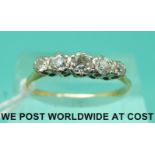 A yellow metal ring set with five diamonds in a platinum setting (size P/Q)