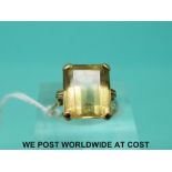 A 9ct gold ring set with a emerald cut citrine (size L)