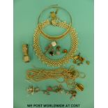 A hallmarked silver charm bracelet and a quantity of costume jewellery, faux pearls, earrings, etc.