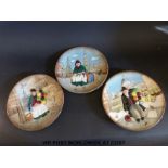 Three Royal Doulton plates including Balloon Seller and Silks and Ribbons