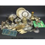 A collection of silver plate to include teapot, Viners, clock,