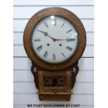 An American drop dial mid to late 19thC wall clock, the two train movement striking on a gong,