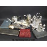 A quantity of silver plated items to include four-bottle cruet set, tea ware,