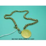 A yellow metal watch chain (25g) with George III guinea fob (8g)