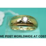 A 9ct gold ring set with a clear stone (size N)