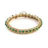 Gold and green stone bracelet