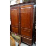 A good 1920s, 18th century style, mahogany panelled wardrobe, 141cm wide.