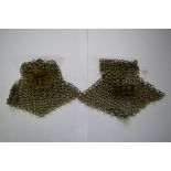 A pair of chain mail epaulettes, from the 30th Lancers.