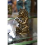 A brass bear model, 8cm, ' The Bear Honey Co Ltd', made by Hawkes & Spinks Ltd, Birmingham.