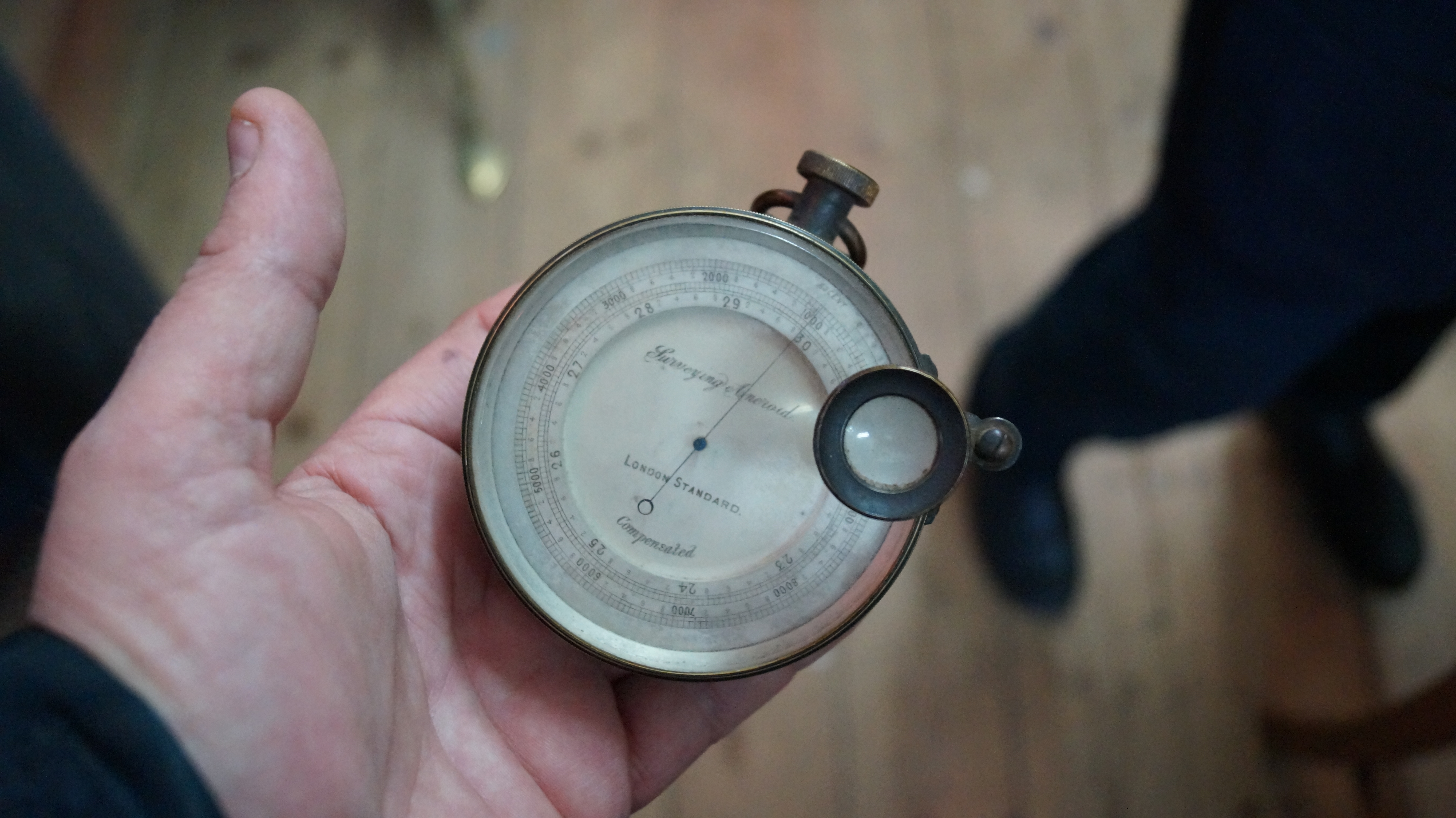 A late Victorian large brass cased pocket barometer, in original fitted leather case. - Image 6 of 7