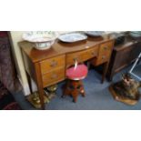 A reproduction, early 19th century style, mahogany and line inlaid bowfront kneehole side table,