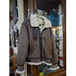 A gentleman's sheepskin three-quarter length coat;