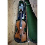 A late 19th century Continental violin, with 14 inch back, and with bow and case.