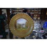 Of local interest: a 19th century cabinet plate, painted with Goodwood House,