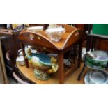 A reproduction mahogany butler's tray on coffee table stand, 71cm when folded.