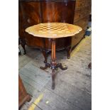 A Victorian walnut and chequerboard tripod occasional table, 59.5cm wide.