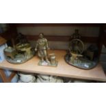 Three brass figure groups.